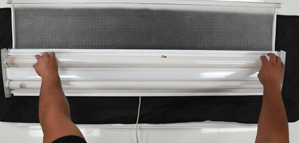 Removing old fluorescent tubes from a lighting fixture